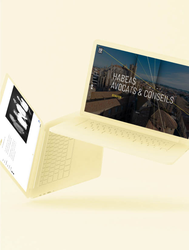Mockup de deux MacBook Pro affichant le site internet de Habeas